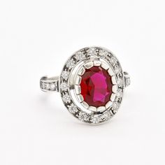 Vintage Ruby Ring set with a Created Ruby in a top grade, perfect diamond cut & flawless clarity, at 10x8mm size (3 Cts). Solid 925 Sterling Silver ☞ made to last. Click here for ☞ Matching Pendant﻿Matching Earrings ☞ please ask meDetails:• Created Ruby in a flawless clarity • Ruby: 10x8mm, 3 Cts, diamond cut • Dimensions: Band width ≈ 2.1mm, thickness ≈ 1.1mm • Solid 925 Sterling Silver SKU 2550 Oval Ruby Ring With Diamond Cut In Platinum, Classic Promise Ring With Lab-created Ruby, Classic Lab-created Ruby Rings For Promise, Classic Oval Lab-created Ruby Diamond Ring, Classic Ruby Cluster Ring With Gemstone, Dazzling Oval Ruby Ring With Prong Setting, Oval Ruby Ring With Vvs Clarity Diamond, Oval Ruby Ring With Platinum Band, Oval Ruby Ring With Platinum Center Stone