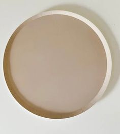 a white plate sitting on top of a table