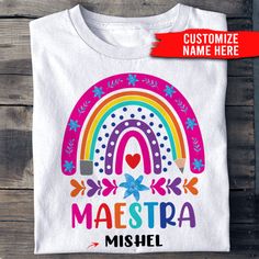 Maestra Rainbow Personalized ShirtMaestra Rainbow Personalized Shirt   This model reduces inventory waste and allows customers to create personalized designs. These t-shirts are made from high-quality materials and come in a range of sizes and colors, making them versatile for any occasion. Personalized Shirts, Long Sleeve Hoodie, Ladies Tops Fashion, Special Gifts, Pink Blue, Return Policy, Hoodie Shirt, Light Pink, To Create