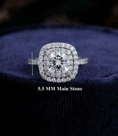 a cushion cut diamond ring with halos and pave diamonds on the band, size guide