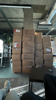 boxes stacked on top of each other in an office