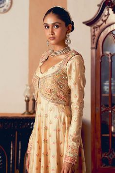 Yellow jacquard silk banarasi crop jacket with floral zari, zardosi and pearls embroidery. Paired with coordinating embroidered kalidar anarkali. - Aza Fashions Elegant Front Open Choli With Intricate Embroidery, Long Sleeve Art Silk Anarkali Set With Intricate Embroidery, Brocade Anarkali Salwar Kameez For Reception, Bollywood Style Front Open Embroidered Sets, Bollywood Style Front Open Sets With Intricate Embroidery, Brocade Anarkali Set With Dabka Work In Traditional Drape, Anarkali Style Bandhgala With Resham Embroidery, Fitted Brocade Anarkali Set With Intricate Embroidery, Front Open Lehenga With Resham Embroidery For Reception