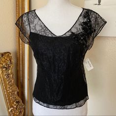 Dkny Black Lace Top With Detached Black Camisole. Size 2 New With Tags , Floral Lace Pattern With Sequin Embellishment . No Damage As It Is New . Comes From A Non Smoking Home. Fitted Lace Top Camisole For Evening, Lace Sleeveless Top For Evening, Spring Formal Camisole Top, Formal Spring Camisole Top, Floral Lace Pattern, Camisole Set, Sequin Embellishment, Black Lace Top, Black Camisole