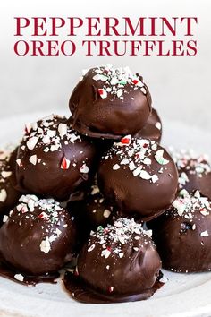 chocolate covered peppermint oreo truffles stacked on top of each other