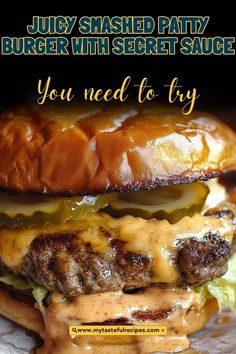 a hamburger with cheese and lettuce on it is shown in this ad for burgers