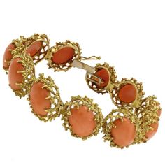 Amazing and elegant clamper bracelet in 18kt yellow gold composed of 11 coral dome surrounded by gold. This bracelet is totally handmade by Italian master goldsmiths gold 35.20gr coral 11.10gr tot weight 46.4gr r.f. rgii,aa BRS158 A video of this item is available upon request. Let us know if you'd like to see it! New arrivals everyday! Follow our store to see more! Yellow Gold Cuff Bracelet, Coral Jewellery, Red Jewellery, Bracelets Red, Message Center, Retro Bracelet, Carnelian Bracelet, Gold Link Bracelet, Coral Bracelet