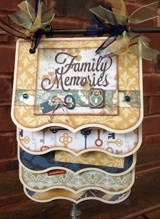 a family memories sign hanging on a brick wall