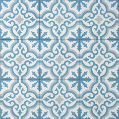 a blue and white tile pattern on the wall