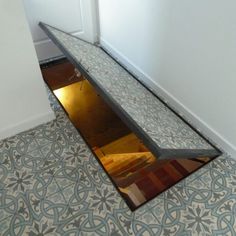 an open door in the middle of a hallway