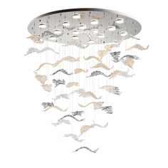 a chandelier with many lights hanging from it's center and two birds flying in the air