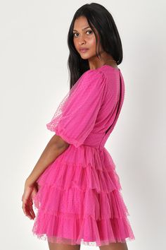 When you arrive wearing the Lulus Dramatic Poise Hot Pink Dot Tulle Puff Sleeve Tiered Mini Dress, your stylish presence is sure to cause a commotion! A sheer tulle overlay (atop a matching knit liner), decorated with delicate textured polka dots throughout, shapes a lightly gathered bodice with a plunging neckline and trendy puff sleeves with elastic at the cuffs. The fitted, banded waist tops a twirl-worthy, tiered skirt that falls to a flirty mini hem. Loop-button closure secures above a cute Chic Swiss Dot Mini Dress For Party, Party Mini Dress In Polka Dot, Feminine Polka Dot Mini Dress, Party Mini Dress With Swiss Dot Pattern, Party Dresses With Swiss Dot And Short Sleeves, Swiss Dot Short Sleeve Party Dress, Short Sleeve Swiss Dot Party Dresses, Pink Puff Sleeve Dress, Gathered Bodice