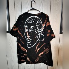 This Upcycled Black Tshirt Has Been Painted And Bleach Dyed By Hand. Comment With Any Questions! Bleached Black T-shirt For Streetwear, Oversized Tie Dye T-shirt With Graphic Print, Oversized Tie Dye Graphic T-shirt, Hand Dyed Relaxed Fit Top For Streetwear, Hand Dyed Graphic Tee Tops For Streetwear, Hand Dyed Black Crew Neck T-shirt, Black Bleached Cotton Tops, Hand Dyed Black Cotton T-shirt, Casual Hand Dyed Black T-shirt