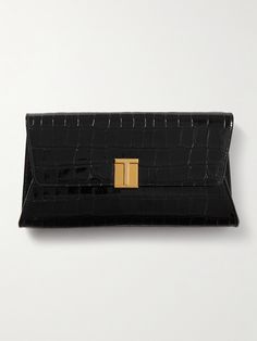 TOM FORD's 'Nobile' clutch will serve as an elegant final touch to evening looks. Crafted from croc-effect patent-leather, it's embellished with the label's gold-tone 'T' hardware and has a matching chain strap. Stow your cardholder, keys and a lipstick inside. Tom Ford Women, Tom Ford Bag, Baggage Claim, Flat Dress Shoes, Bag Belt, Designer Clutch, Black Clutch, Luxury Bag, Boot Pumps