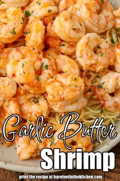 garlic butter shrimp is served with pasta and parsley