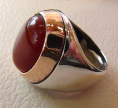 aqeeq red liver agate carnelian natural stone semi precious cabochon oval heavy man ring sterling silver bronze all sizes fast shipping Risk free Quality guarantee policy : If you are not satisfied with your item for any reason simply send it to us and you will get a replacement or refund . please write or choose your size with the order and we will size it for you . Our ring is handcrafted mostly with a few simple tools . but some methods are used in casting like lost wax method . sterling silv Red Oval Cabochon Jewelry With Polished Finish, Anniversary Carnelian Signet Ring With Polished Finish, Polished Carnelian Oval Rings, Formal Carnelian Oval Cabochon Jewelry, Polished Agate Oval Cabochon Rings, Formal Oval Cabochon Carnelian Jewelry, Oval Carnelian Gemstone Signet Ring, Oval Cabochon Agate Ring With Polished Finish, Polished Carnelian Ring