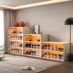 a living room filled with lots of furniture and shelves full of shoes on top of them