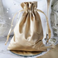 "View All Colors: https://etsy.me/3YQcT0Z Quantity: 12 Gift Bags Material: Satin Color: Champagne Fillable Size: 5\" x 6\" Bag Size: 5\" x 7\" Perfect for packaging jewelry, candies, or gifts. Champagne Drawstring Bag These satin party favor bags have a glamorous gloss that is so eye-catching; just fill these candy bags with delectable favors like chocolates, candies, nuts or sweet knick-knacks for the delight of your guests. You can even use these drawstring pouch to secure your jewelry items w Handmade Candy, Colors Wedding, Candy Jewelry, Wedding Gift Bags, Wedding Favor Bags, Wedding Banquet, Satin Bags, Gold Bag, Gold Satin