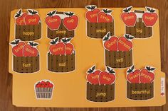 an apple themed bulletin board with lots of apples on it