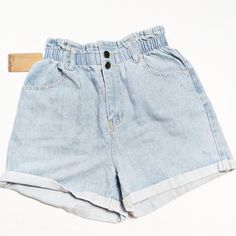 Plaid & Plain Light Wash Paperbag Waist Cuffed Denim Shorts Nwt. Waist Has Elastic. Size Medium. New With Tags. 100% Cotton. Measurements Laying Flat Approximate Waist: 12" Rise: 13" Inseam: 4" No Trades. Offers Welcome. High Waisted Floral Shorts, Tap Shorts, Zara Trousers, Plain Blue, High Waisted Black Jeans, Elastic Waist Jeans, High Rise Denim Jeans, Cuffed Denim Shorts, Mom Jeans Shorts