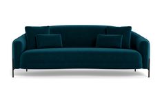 a blue couch with three pillows on it's back and one arm facing the camera