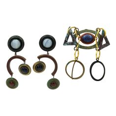 1980s Modernist industrial earrings and brooch by Dannah featuring a dangling mixed metal design with stone accents mostly onyx and chalcedony.  The pieces have tarnished over the years and have a green patina from the copper on some of the pieces.  The earrings are very long 3.62" long by about 1.5" wide.  They have a clip on back - no posts.  They are not too heavy. The brooch has a pin that goes through fabric and is they attached with a screw back - similar to a tie tac or screw back earring Industrial Earrings, Green Patina, Long Drop Earrings, Jewelry Inspo, Screw Back Earrings, Mixed Metals, Metal Design, Metallica, Screw