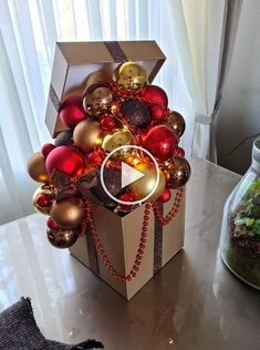 a box filled with ornaments on top of a table