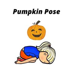 a child laying on the ground next to a pumpkin