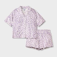 Your kid will hit the hay in cute style with this 2-Piece Short-Sleeve Coat Pajama Set from art class™. This set includes a sleep shirt and shorts, both crafted from recycled polyester knitted fabric for comfortable wear. The short-sleeve button-down shirt features a classic notched collar with a chest patch pocket, while the ruffled hem shorts have a full elastic waistband for a snug fit. Mix and match the set with other PJ separates for a variety of looks. art class™: One-of-a-kind looks for t Short Sleeve Coat, Button Up Pajamas, Leopard Shorts, Flannel Pants, Print Coat, Fabric Tape, Kids Outfits Girls, Sleep Shirt, Pajama Shirt