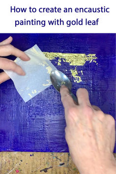 a person using a spoon to paint with gold leaf