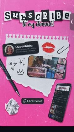 a pink notebook with some stickers on it and a cell phone next to it