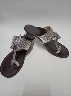 Handmade Authentic Kolhapuri Chappals with block heels is a Classic,Slip ons,Slippers,Flip flops,Partwear footwear,festive wear,Casual wear,Indo western wear If your size is not available in the size chart,message me for the same or any other query. CAN BE MADE IN YOUR CHOICE OF COLOUR AND SIZE The upper of the kolhapuri has been made with great detail and can be use for dailywear or on ethnic outfits. This makes the chappals suitable for all types of wearers as they turn soft and comfortable af Traditional Closed Toe Leather Heels, Traditional Leather Closed Toe Heels, Festive Sandals With Gota Work For Diwali, Festive Closed Toe Sandals With Gota Work, Festive Sandals With Gota Work And Single Toe Strap, Traditional Sandals For Diwali Festival, Traditional Closed Toe Sandals For Festive Occasions, Traditional Heels With Round Toe For Festivals, Traditional Round Toe Heels For Festival