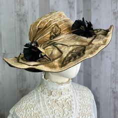 "Authentic c1900-1910 Edwardian Dress Hat. (Gibson Girl Style). * listing is for hat only, Edwardian clothing is sold separately.  FEATURES: A lovely Edwardian women's hat from the early 1900's.  Mocha brown velvet with shades of chocolate brown and black. There are several little feather trumpets arranged along the brim, and embellished with oversized autumn theme embroidery. Floppy brim style, and crown is stitched to fold over on one side.  *The hat does have some notable issues and could use some TLC, (refer to condition section below for details) however this would make a great hat for a dedicated collector!  MEASUREMENTS: Crown 4.5\" Brim 2.5-4.5\" width 17\" CONDITION: pre-owned antique condition.  NOTABLE ISSUES: substantial balding within the velvet fabric and silk lining undernea Victorian Fitted Hats For Costumes, Curved Brim Top Hat For Kentucky Derby Costume, Victorian Fitted Costume Hats, Victorian Style Fitted Costume Hats, Vintage Gold Hat With Flat Brim, Victorian Short Brim Hat For Vintage Events, Victorian Fitted Brimmed Costume Hats, Victorian Costume Hat With Curved Brim, Victorian Hat With Short Brim For Church