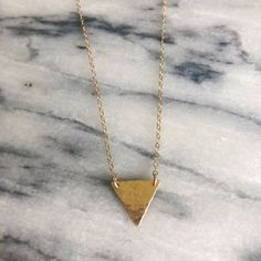 "W H A T ∙ M A K E S ∙ T H I S ∙ S P E C I A L - This dainty hand textured 14K gold filled triangle charm necklace is perfect for layering or to wear alone for a classic, minimalist look. - All pieces are handmade in my studio in sunny Santa Monica, CA. G I F T S All pieces are sent out in beautiful and unique packages and I try to be environmentally responsible whenever possible. I am happy to help you create a unique gift for a friend or loved one upon request. Please leave me a note during ch Gold Triangle Jewelry For Anniversary, 14k Gold Triangle Shaped Jewelry, 14k Gold Triangle Jewelry, 14k Gold Triangle Jewelry In Gold Color, Dainty Gold Triangle Jewelry, Triangle Necklace, Gold Pendant Necklace, Santa Monica, Boho Jewelry