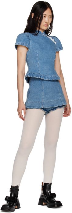 Stretch denim skort. Fading throughout. · Paneled and layered construction · High-rise · Zip closure at back · Elasticized cuffs at bloomer-style underlay · Contrast stitching in white Available exclusively at SSENSE. Supplier color: Blue Chic Fitted Denim Top With Ruffles, Fitted Denim Blue Top With Ruffles, Fitted Short Sleeve Denim Top For Spring, Fitted Denim Top With Short Sleeves For Summer, Shushu Tong, Denim Skort, 3d Rose, Denim Blouse, Blue Band