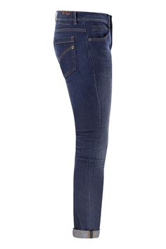 These jeans are all about keeping it effortlessly stylish, whether you're headed to a laid-back gathering or just running your daily errands. Crafted in Italy, they offer the perfect blend of comfort and flexibility, thanks to a unique fabric mix. Trust me, once you put them on, they'll quickly become your go-to pair. Skinny fit with a low-rise design Five-pocket style for practicality Made from 92% cotton, 6% elastomultiester, and 2% elastane Color: Dark Denim Subtle metal logo detail Durable b Hand Stretch, Unique Fabric, Logo Label, Just Run, Top Designer Brands, Mixing Fabrics, Metal Logo, Pocket Jeans, High End Fashion