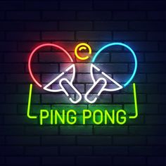 table tennis neon sign on brick wall