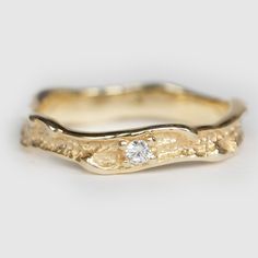 14k Gold Band (Also available in White and Rose Gold, Please select at checkout) Style: Hammered Width: 3.5mm Metal: 14k Gold Finish: Polished Weight Approximately: 2.8 Grams White Diamonds Total Weight: 0.05 Carats Color: SI-H (White Diamond, Brilliant Cut) Ring can be resized from 3-12, Metal can be made in 14, 18K/ White, Yellow and Rose Gold. For custom order this ring with a different stone, please contact us. Wedding Ring With Diamond Band, Wedding Ring With Diamond, Hammered Wedding Ring, Hammered Wedding Rings, Modern Wedding Rings, Hammered Wedding Bands, Engagement Rings Twisted, Wedding Ring For Her, Diamond Band Ring