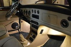 the interior of an old car is clean and ready to be used