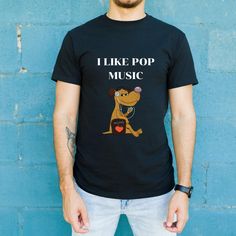 This music-inspired T-shirt exudes a casual and cool vibe, perfect for music lovers and laid-back individuals. It is ideal for everyday wear, concerts, music festivals, and casual gatherings. Product features - Unisex fit for versatile styling - Made with lightweight and breathable 100% Airlume combed and ring-spun cotton - Ribbed knit collar and shoulder tape for added durability - Retail fit for casual and semi-formal settings - Ethically manufactured by Bella+Canvas with humane practices Care instructions - Machine wash: cold (max 30C or 90F) - Non-chlorine: bleach as needed - Tumble dry: low heat - Iron, steam or dry: medium heat - Do not dryclean Music Festival Outfits, Top Music, Musician Gifts, Festival Clothing, Music Festivals, Music Lover, Sound Of Music, Knit Collar, Festival Outfits