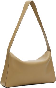 Nappa calfskin shoulder bag in taupe. · Fixed shoulder strap · Logo embossed at face · Magnetic flap · Patch pocket at interior · Faille lining · H6.5 x W12 x D2.5 Supplier color: Grain terra Designer Beige Leather Baguette Bag, Beige Baguette Shoulder Bag For Formal Occasions, Formal Beige Baguette Shoulder Bag, Beige Leather Baguette Bag, Luxury Beige Leather Baguette Bag, Modern Beige Soft Leather Baguette Bag, Beige Leather Baguette Bag For Office, Office Beige Leather Baguette Bag, Beige Rectangular Shoulder Bag With Smooth Grain