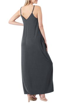 Beautiful casual loose fitting maxi dress with pockets and an adjustable strap. Great to wear by itself or also to layer. Cami style top maxi dress. 




 Fabric: 55% Polyester | 40% Rayon | 5% Spandex 
 Adjustable Strap | Side Pockets | Floor Length 
 Premium Fabric | V Neck | Cami Style 
 Size : Small 4-6 | Medium 8-10 | Large 12-14 | X-Large: 16 
Full Length: 49" | Chest to Bottom: 34"
 Model is wearing size Small Maxi Dress With Pockets, Strap Maxi Dress, Bohemian Maxi, Spaghetti Strap Maxi Dress, Bohemian Maxi Dress, Dress With Pockets, Premium Fabric, Hip Length, Dress Fabric