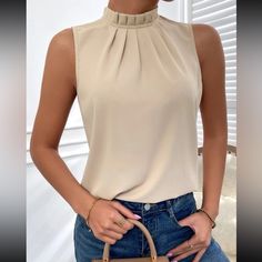 Elegant Non-stretch Beige Tops, Chic Sleeveless Non-stretch Blouse, Chic Non-stretch Sleeveless Blouse, Elegant Non-stretch Sleeveless Blouse, Elegant Sleeveless Non-stretch Blouse, Non-stretch Sleeveless Blouse, Trendy Sleeveless Top For Office, Trendy Sleeveless Office Top, Classy Blouses