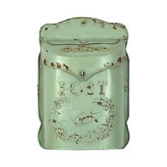 an old fashioned green tin canister with the word too on it's side