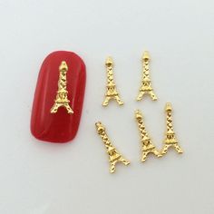 Eiffel Tower Metal Alloy Nail Art Deco Nail Charms. They are 11 mm x 4.5 mm. The pieces are available in silver or gold. They are reusable and can be applied to natural or polished nails. These charms can also be used to dress up other objects like: key chains, jewelry, zippers, and other items. They are very easy to apply and can be done by a nail tech or even yourself. This is a great way to make yourself have a unique look all your own. Eiffel Tower Nails, Nail Gold, Skull Nail Art, Polished Nails, Skull Nails, Nail Charm, Art Deco Nails, Silver Nail, Nail Jewelry