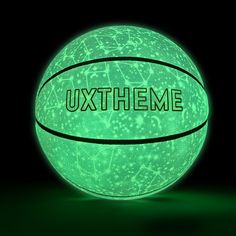 an illuminated basketball with the word uxtheme written on it in black and green