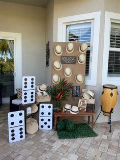 a group of dices sitting on top of a table in front of a house