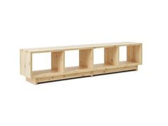 a wooden shelf with three compartments on it