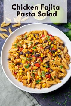 chicken fajita pasta salad in a white bowl on a table with the title above it