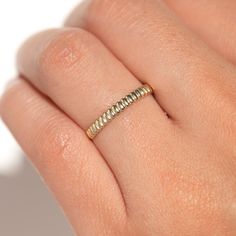 Adorn your finger with our Fine Hope Ring, crafted from solid gold. Delicately designed, its eye-catching curves will captivate onlookers. Add it to your collection now. Adjustable White Gold Plated Rings, Modern Twist 14k Gold Bypass Ring With Polished Finish, Gold Rings With A Modern Twist For Promise, Gold Rings With A Modern Twist, Adjustable Stackable Yellow Gold Dome Ring, Minimalist Gold Plated Diamond Cut Rings, Minimalist Diamond Cut Gold Plated Rings, Modern Twist Promise Ring With Polished Finish, Modern Twist 14k Gold Ring With Polished Finish