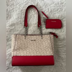 Calvin Klein Red And Beige Shoulder Bag And Wallet Set. Never Used! Both Purse And Wallet Are Free Of Imperfections, Stains Or Wear To The Material. Red Everyday Bags With Card Slots, Red Shoulder Bag With Card Slots, Red Shoulder Bag With Card Slots For Everyday, Everyday Red Shoulder Bag With Card Slots, Calvin Klein Tote Bag, Calvin Klein Purse, Beige Shoulder Bag, Calvin Klein Handbags, Calvin Klein Bags